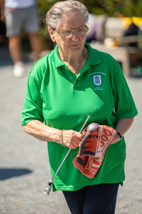 A woman playing petanque